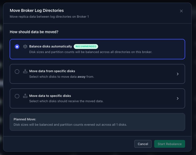 Move Broker Log Directories dialog with options to balance disks automatically, move data from specific disks, or move data to specific disks.
